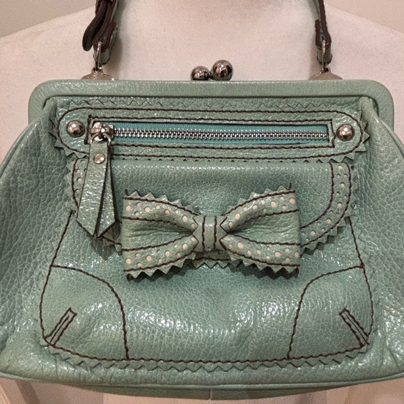 ISABELLA FIORE handbag great vintage condition
No stains odors or tears. Mint. - Picture 2 of 7